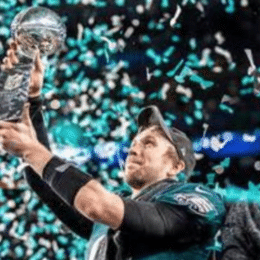 Nick Foles, named Super Bowl MVP, holds up the Lombardi trophy, the first for both himself and the Eagles franchise.