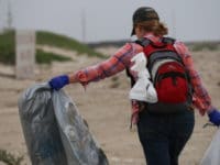 "Beach clean up" by USFWS Pacific Southwest Region is licensed under CC BY 2.0